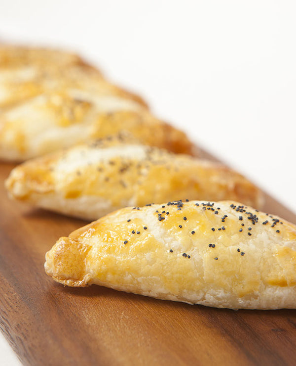 A photo of Minced beef curry puffs with onion, potato and light soy. Perfect for events of all sizes.