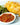 A photo of a pasties contain a small amount of beef mince, lots of potato, onion and a small amount of carrot.