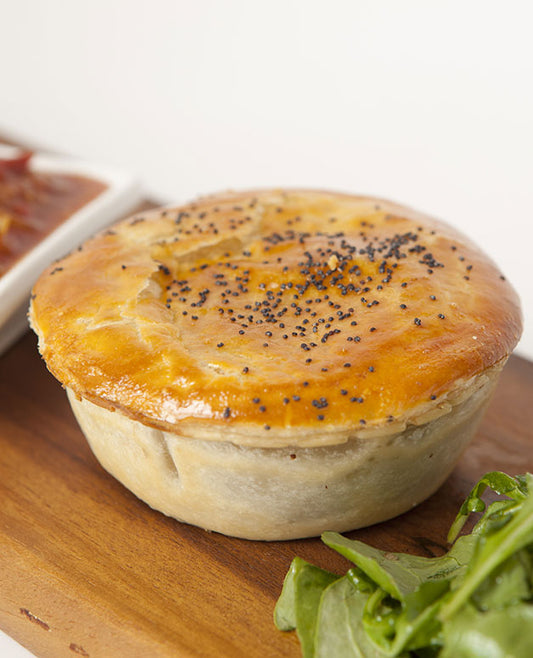 A photo of a Mince Meat Pie with lemongrass and a hint of Chilli.